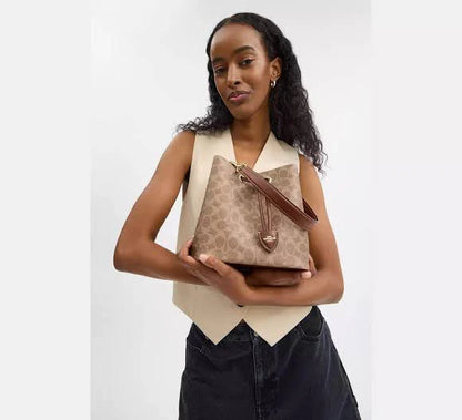 Rowan Bucket Bag In Signature Canvas