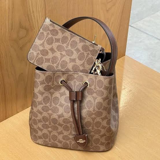 Rowan Bucket Bag In Signature Canvas