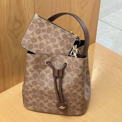 Rowan Bucket Bag In Signature Canvas