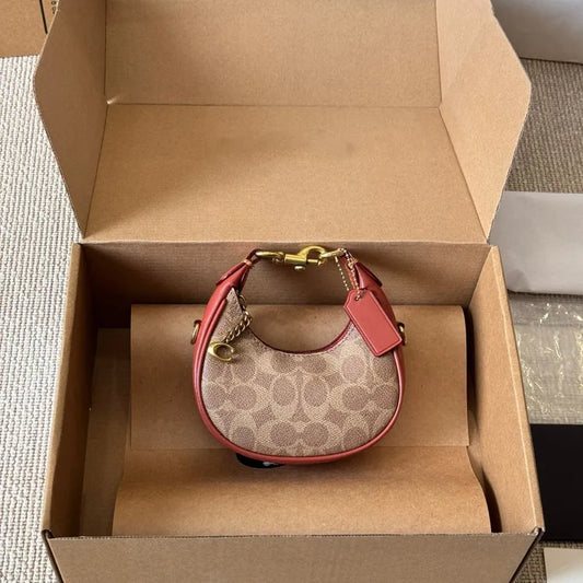 Coach cross bag in Gold