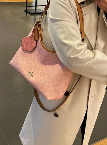 New Coach in pink