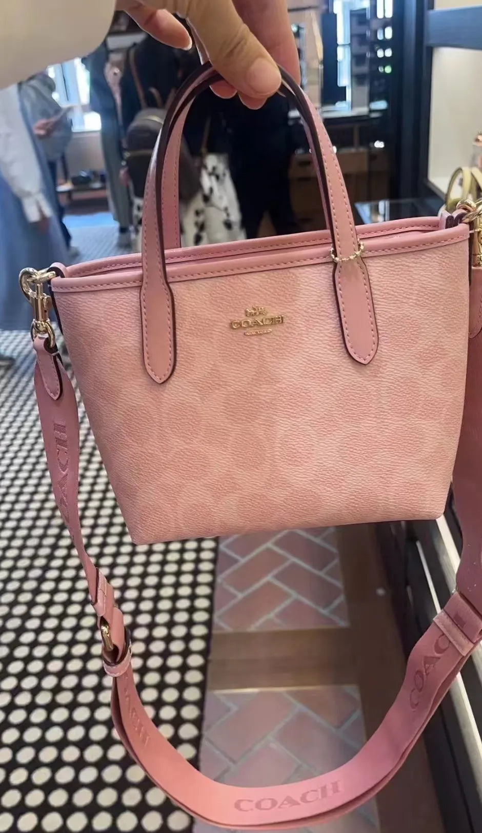 Coach in pink