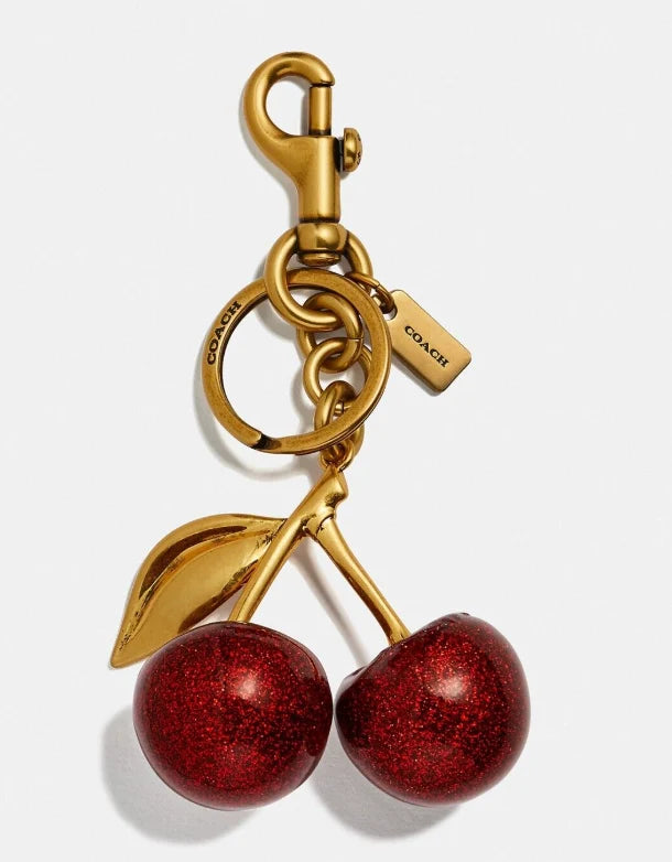 COACH gold-tone cherry bag charm