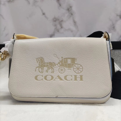 COACH in white