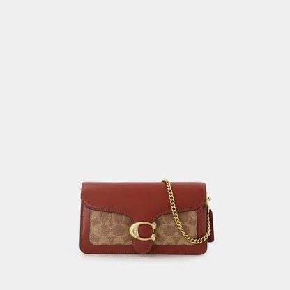 COACH in Brown