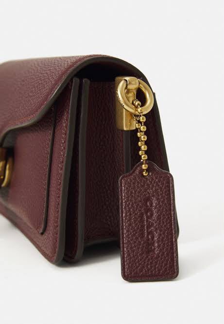 COACH in burgundy