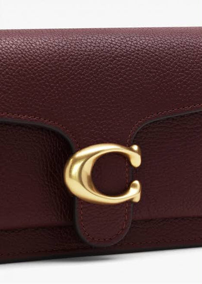 COACH in burgundy