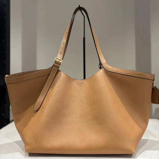 COACH in Gold